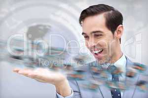 Pleased businessman looking at a picture whirl