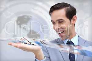 Happy businessman looking at a picture stream