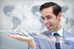 Pleased businessman looking at a picture stream