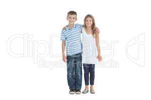 Young brother and sister holding each other
