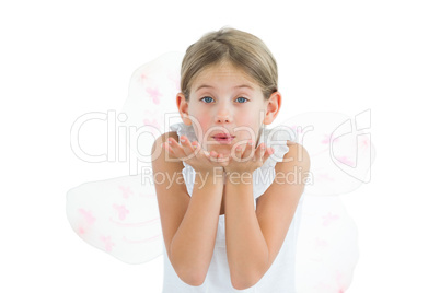 Cute young girl sending kiss to camera