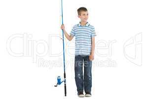 Pensive young boy holding fishing rod