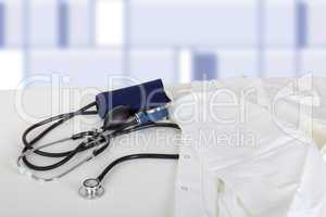 Doctor's coat and stethoscope on the table