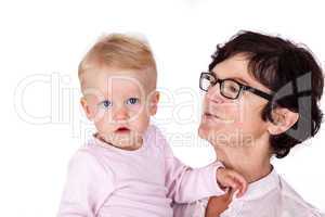 Woman holding infant in arms
