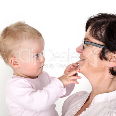 Woman holding infant in arms