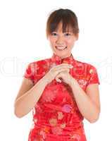 Chinese cheongsam woman greeting
