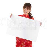 Chinese cheongsam girl holding placard