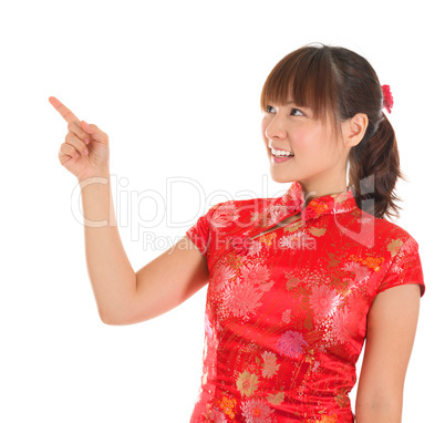 Chinese cheongsam girl finger pointing