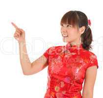 Chinese cheongsam girl finger pointing