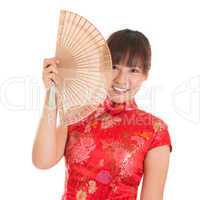 Chinese cheongsam woman with fan