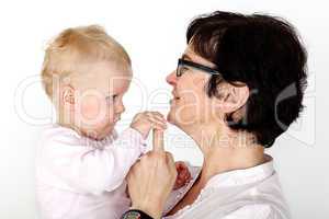 Woman holding infant in arms