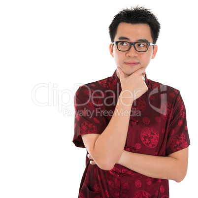 Chinese cheongsam male having a thought
