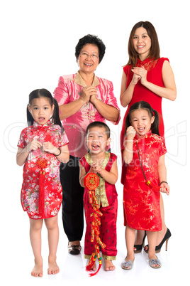 Asian Chinese family greeting on Chinese New Year