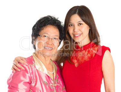 Asian senior mother and adult daughter