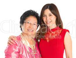 Asian senior mother and adult daughter