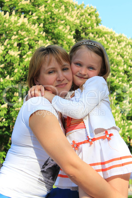 mother and daughter embrace