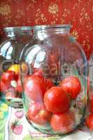 tomatos in jars prepared for preservation