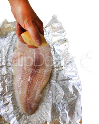 cooking of dish with mackerel with lemon juice