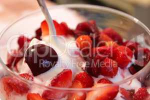 icecream with berries of cherry and wild strawberry