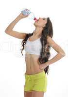 sporty girl is drinking water