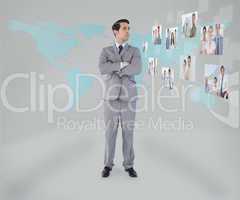 Businessman standing on map background