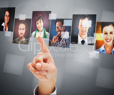 Female finger pointing at digital interface