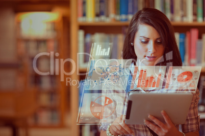 Pretty student working on her futuristic tablet pc