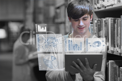 Young man studying on his digital tablet pc