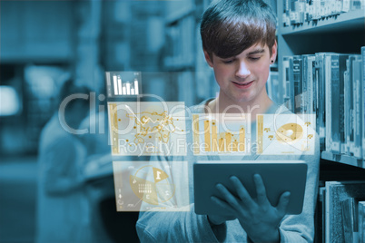 Young man studying on his digital tablet