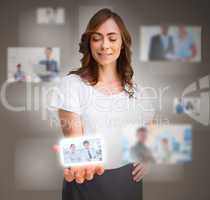 Businesswoman presenting picture of coworkers