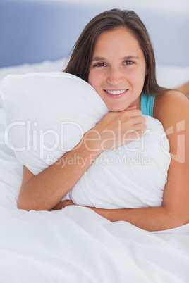 Woman lying in bed