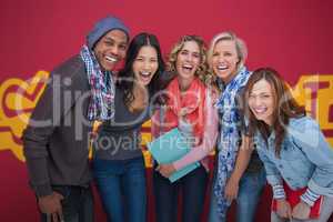 Group of cheerful friends laughing together