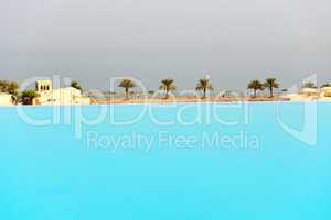 the view from swimming pool on a beach, ras al khaima, uae