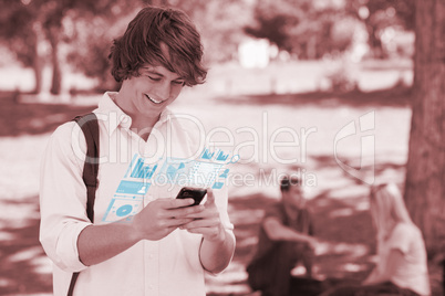 Happy student using his digital smartphone