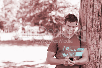 Happy handsome student using his digital smartphone