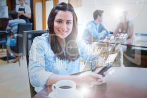 Smiling young woman studying on futuristic smartphone
