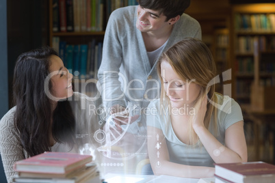 Smiling students working together with futuristic interface