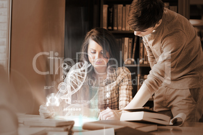 Focused college students analysing dna on digital interface