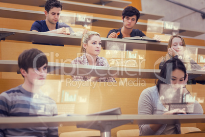Concentrated students in lecture hall working on their futuristi