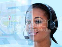 Beautiful call center worker using futuristic holographic interf