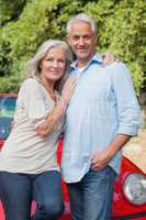 Smiling mature couple posing