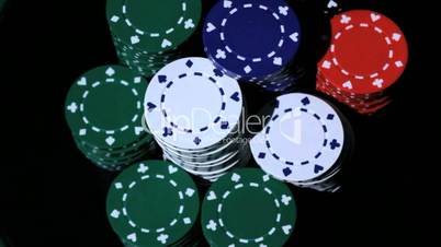 Stack of colorful poker chips.