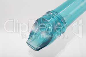 Macro shot of a blue plastic flute