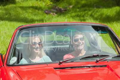 Happy young couple going for a ride together