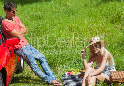 Happy couple having picnic together