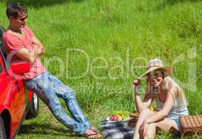 Happy couple having picnic together