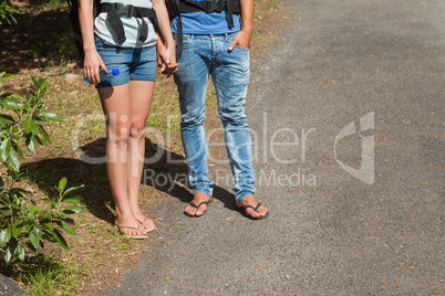 Legs of couple going for a trek together