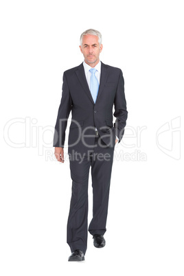 Businessman walking to camera