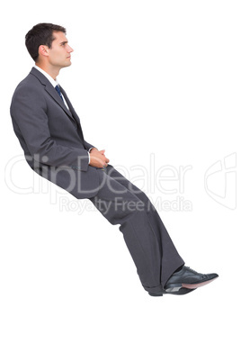 Classy young businessman sitting