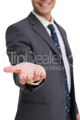 Businessman showing his empty hand